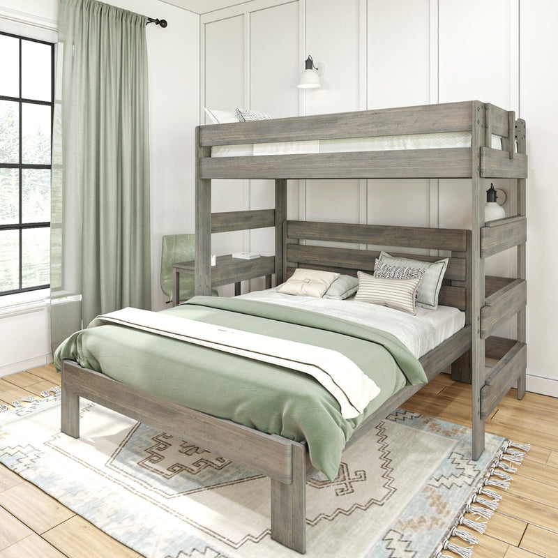 Rustic gray wooden loft bunk bed (twin-over-full) with green bedding, built-in ladder and desk, wall sconce and window in a modern farmhouse kids' bedroom with patterned rug