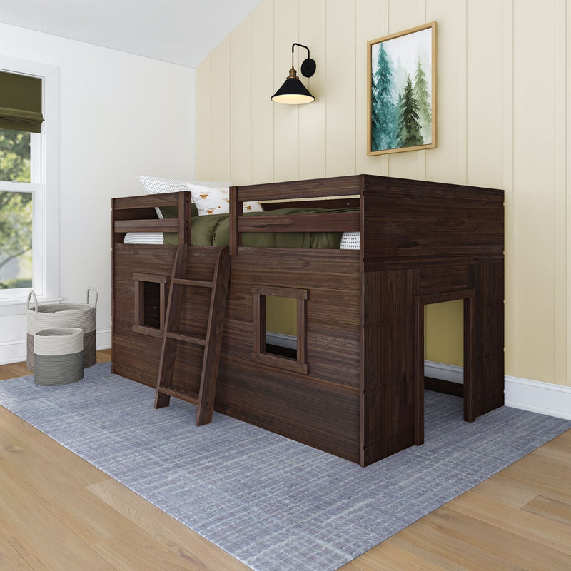 Dark wood kids loft bunk bed with ladder and green bedding in a cozy modern children's bedroom with wall sconce and framed tree art