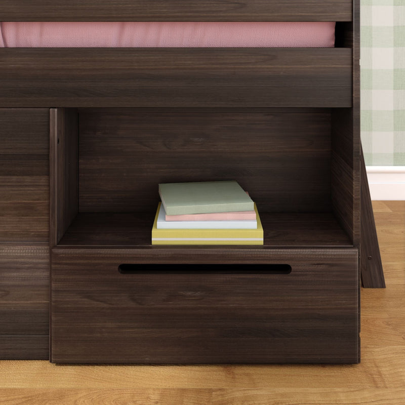 Dark walnut bunk bed cubby with stacked pastel books, built-in drawer handle, pink mattress and green plaid curtain