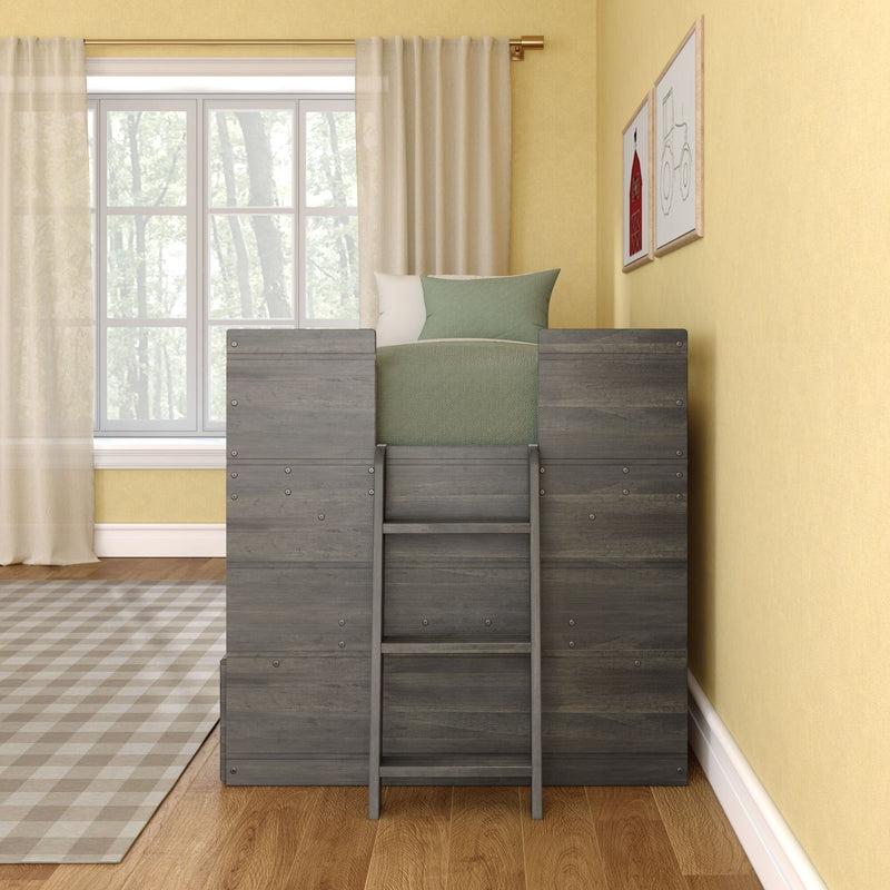 Gray wooden loft bed with ladder and green bedding in a sunny yellow bedroom with large window, sheer curtains, framed wall art and checkered rug