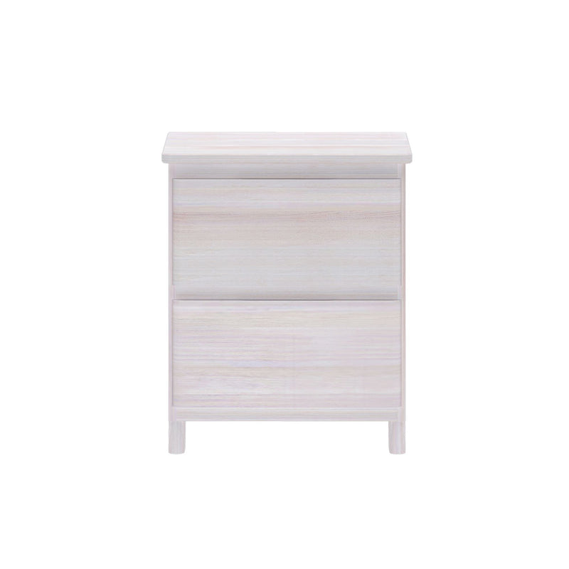 Whitewashed wood three-drawer nightstand with slim top and tapered legs — modern Scandinavian-style bedroom storage dresser