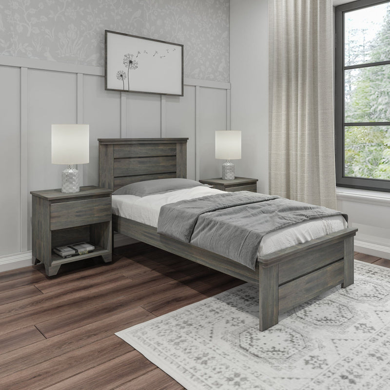 Modern farmhouse bedroom with gray wooden bed and nightstands, neutral bedding, table lamps, hardwood floors, dandelion wall art.