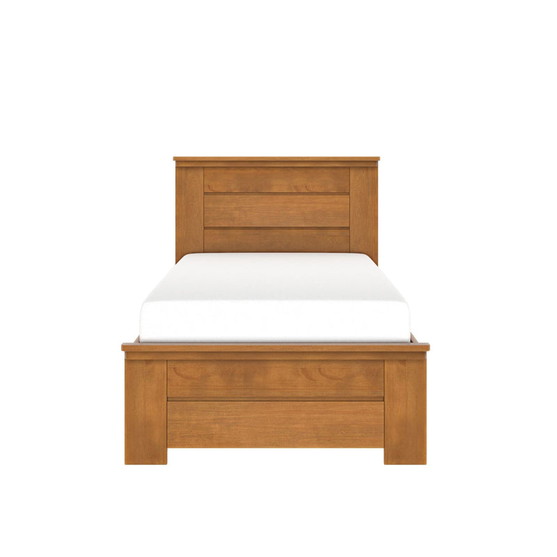 Solid wood twin bed with paneled headboard and white mattress, natural honey finish farmhouse-style bed frame