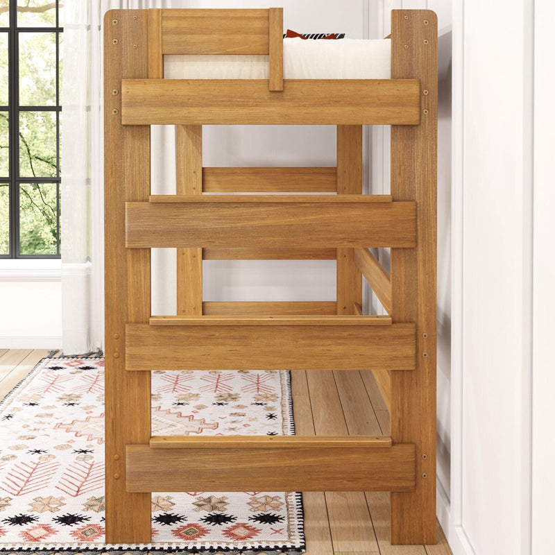 Solid wood bunk bed frame with safety rail and ladder in bright bedroom featuring patterned area rug and hardwood floor