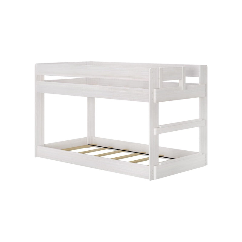 White wooden loft bed frame with upper guardrail and slatted lower platform, twin-size children's loft bed in whitewashed finish