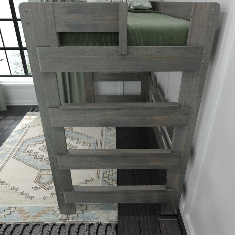 Gray solid-wood bunk bed ladder and safety rails with green bedding in a modern farmhouse kids' bedroom, close-up of loft bed construction