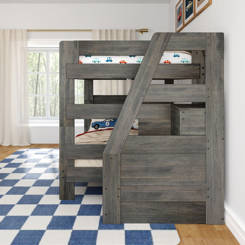 Gray wooden bunk bed with ladder, car-themed kids bedding, blue checkered rug, sheer-curtain window and framed car prints.