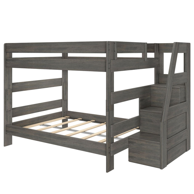 Gray wood twin-over-full bunk bed with built-in storage staircase, slatted mattress platform, safety guardrails and modern farmhouse finish