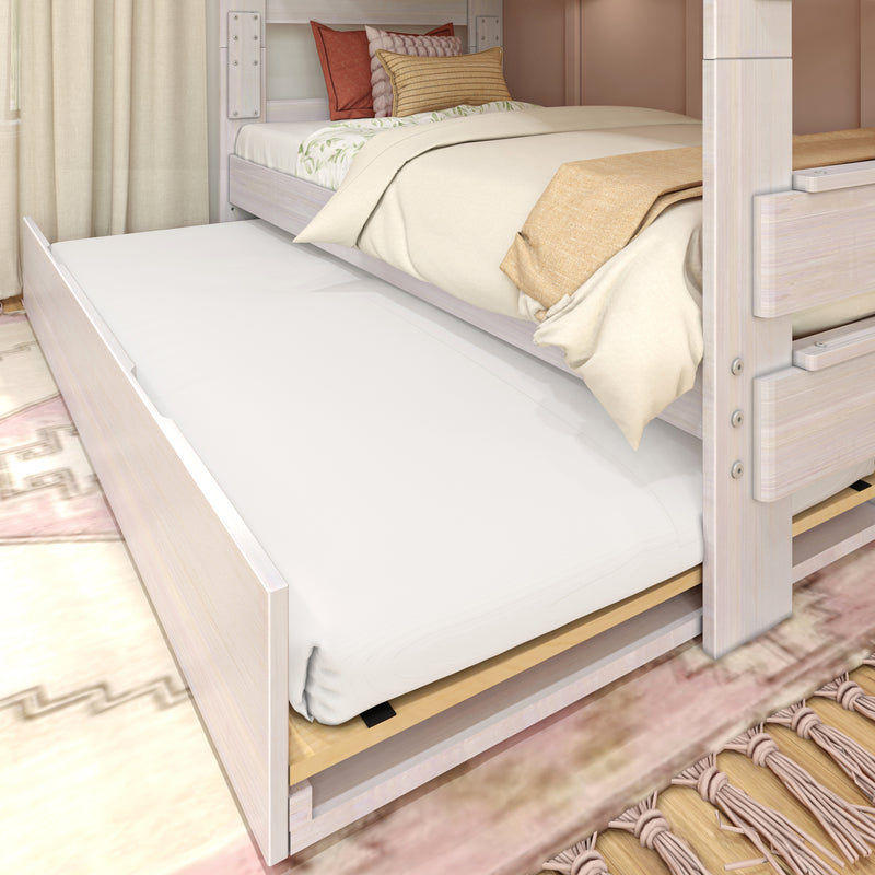 Space-saving whitewashed wooden bunk bed with pull-out trundle mattress, cream bedding, textured pillows and boho rug
