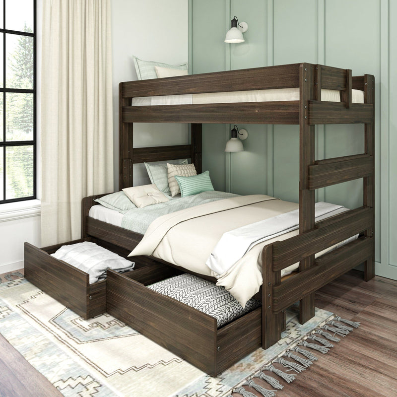 Dark wood twin-over-full bunk bed with pull-out trundle and under-bed storage drawers in a mint-green modern farmhouse bedroom with layered bedding, accent pillows, wall sconces and large window