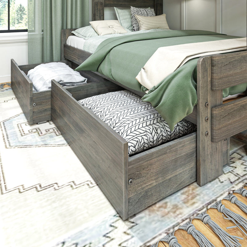 Rustic gray wooden bed with pull-out trundle storage drawers, green duvet and patterned mattress in modern farmhouse bedroom