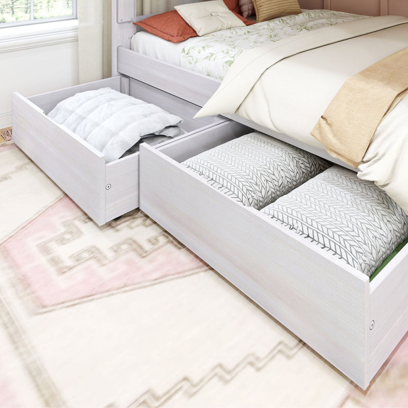 White wooden storage bed with pull-out underbed drawers holding pillows, comforter and bedding — space-saving bedroom storage solution