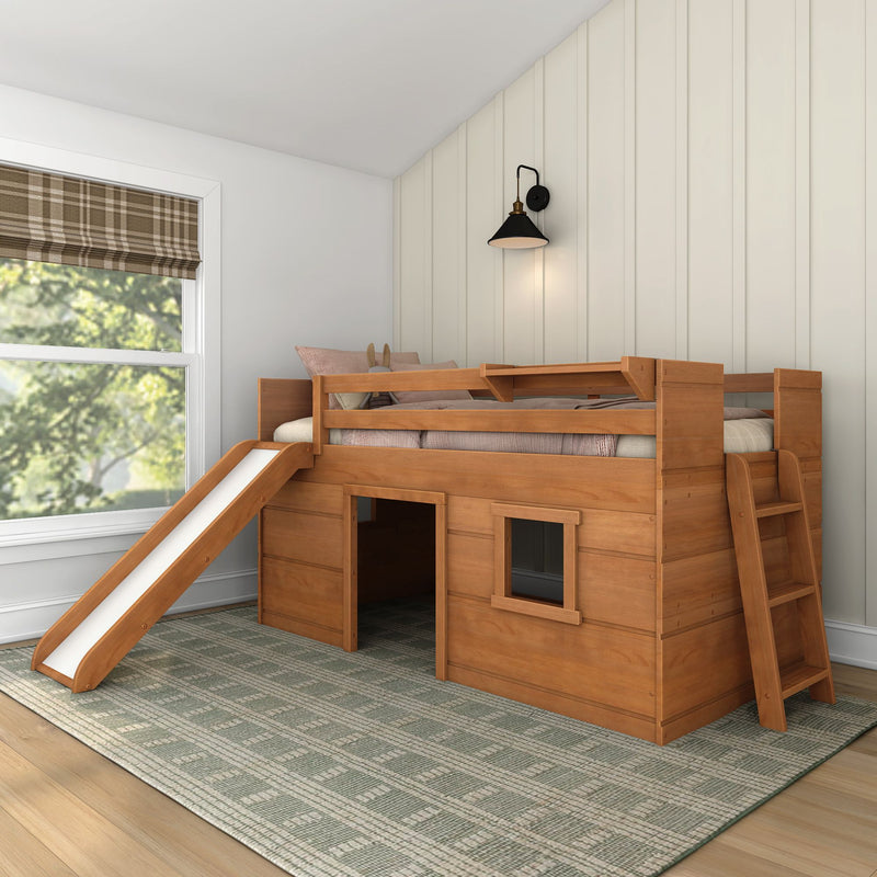 Wooden kids loft bed with slide and ladder in bright children's bedroom with cream board-and-batten wall, black wall sconce and brown plaid Roman shade
