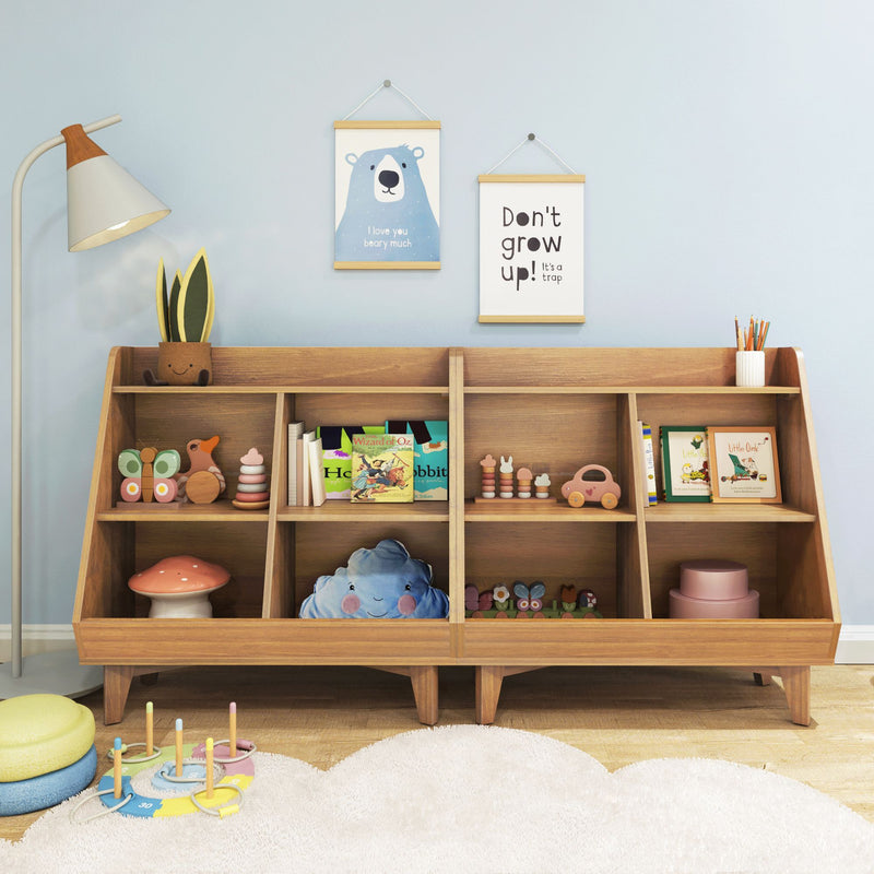 Children's playroom nursery with wooden toy cubby shelf, books, plush toys, pastel blue wall and hanging bear prints