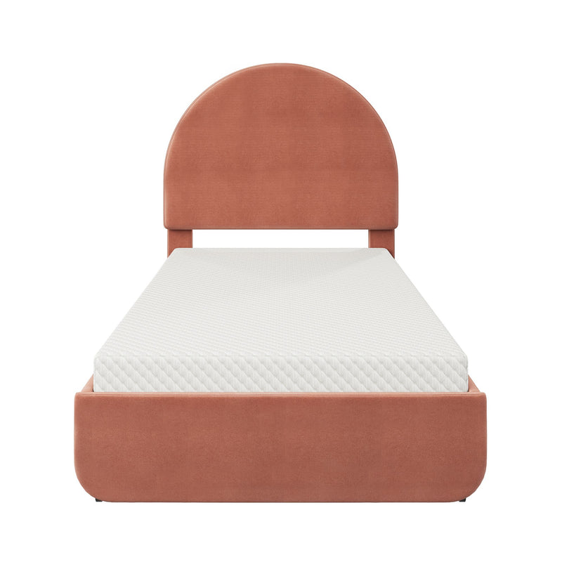 Terracotta velvet upholstered twin bed with arched headboard and white quilted mattress, modern platform bed