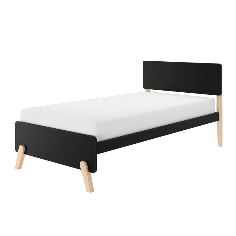 Modern black twin bed frame with low rounded headboard, white mattress and natural wood legs — minimalist Scandinavian-style single bed for small bedrooms