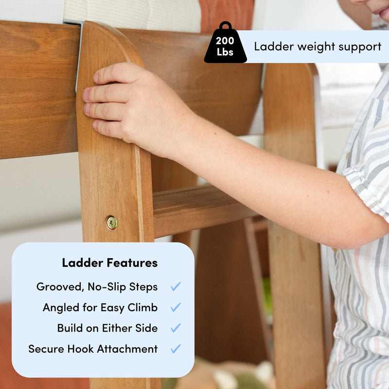 Close-up of wooden bunk ladder with hand on side rail, 200 lb weight capacity label, grooved no‑slip steps and secure hook attachment