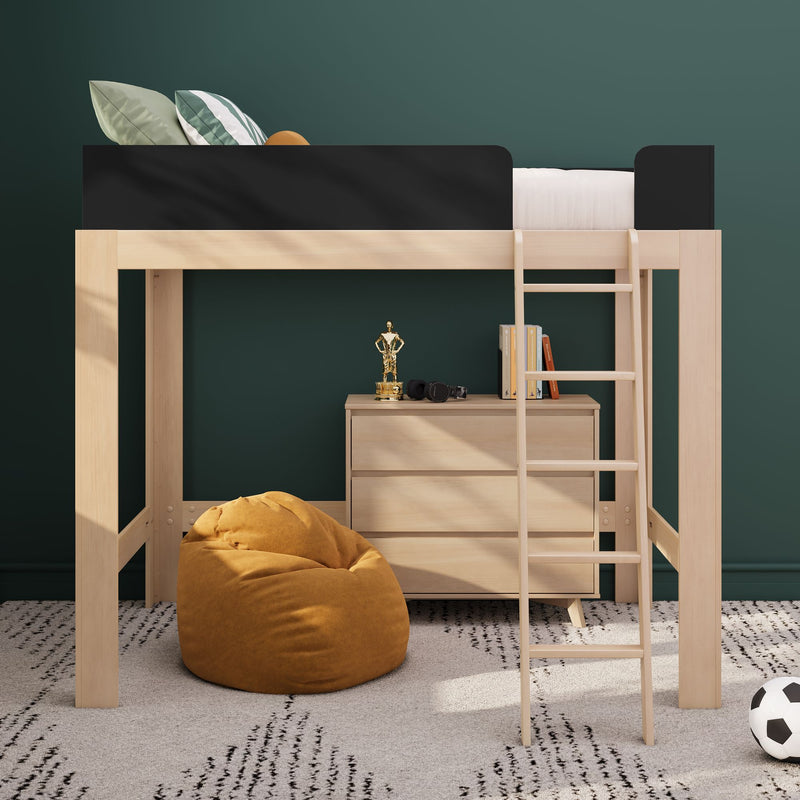 Modern wooden loft bed with ladder and under-bed storage dresser in kids bedroom with green accent wall and mustard bean bag