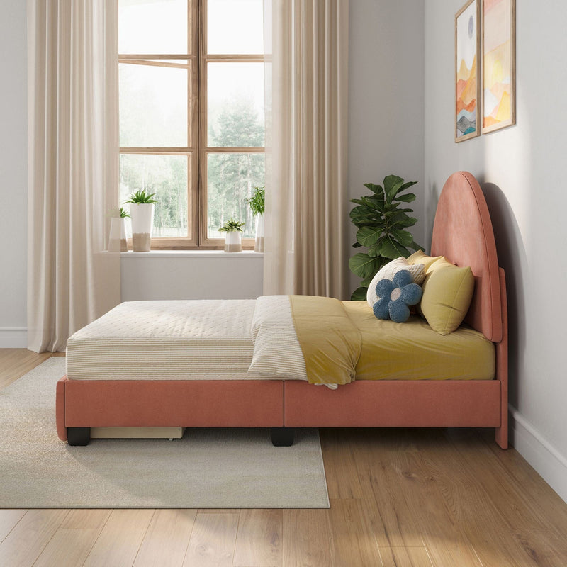 Modern cozy bedroom with coral upholstered bed, mustard bedding and flower-shaped pillows, large wooden window with sheer curtains, indoor plants and light hardwood floor