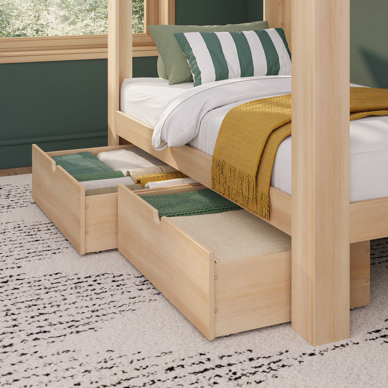 Solid natural wood platform bed with built-in under-bed storage drawers, green striped pillow and mustard throw in cozy bedroom