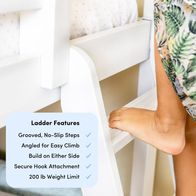 Close-up of a child's bare foot climbing a white wooden bunk bed ladder with grooved non-slip steps and floral bedding nearby
