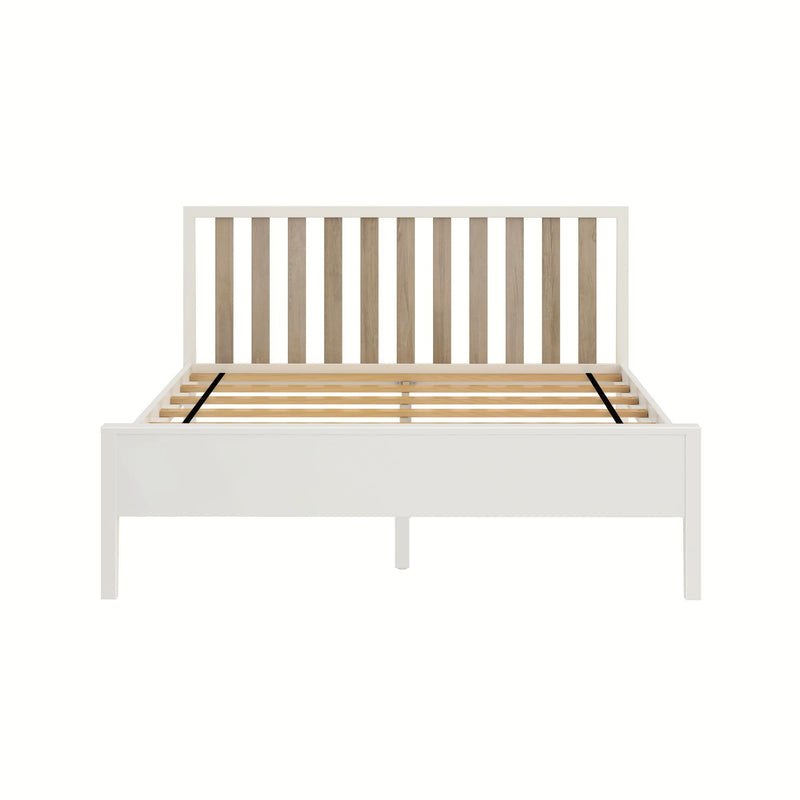 White wooden platform bed frame with vertical natural wood slatted headboard and wooden slat support, modern farmhouse style