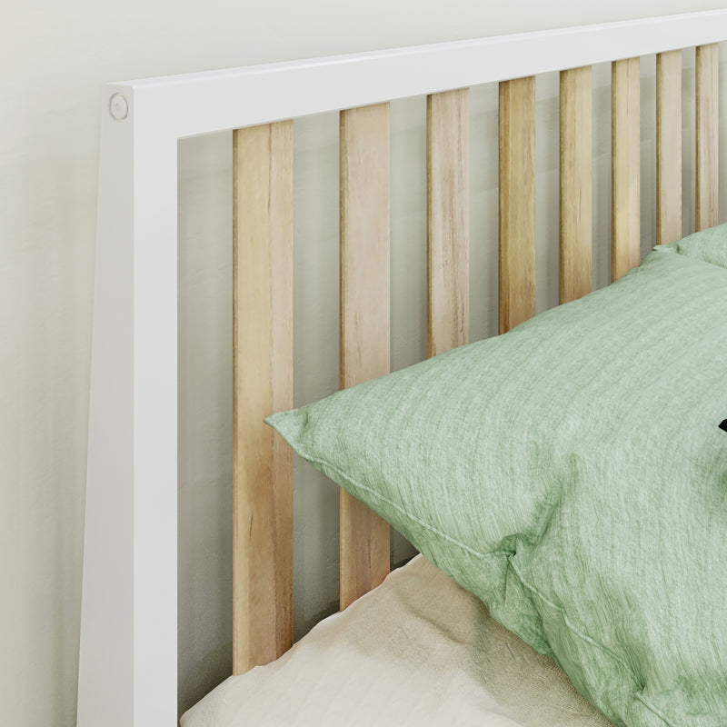 Close-up of modern white-framed wooden slat headboard with light wood slats and green linen pillow, minimalist bedroom decor.