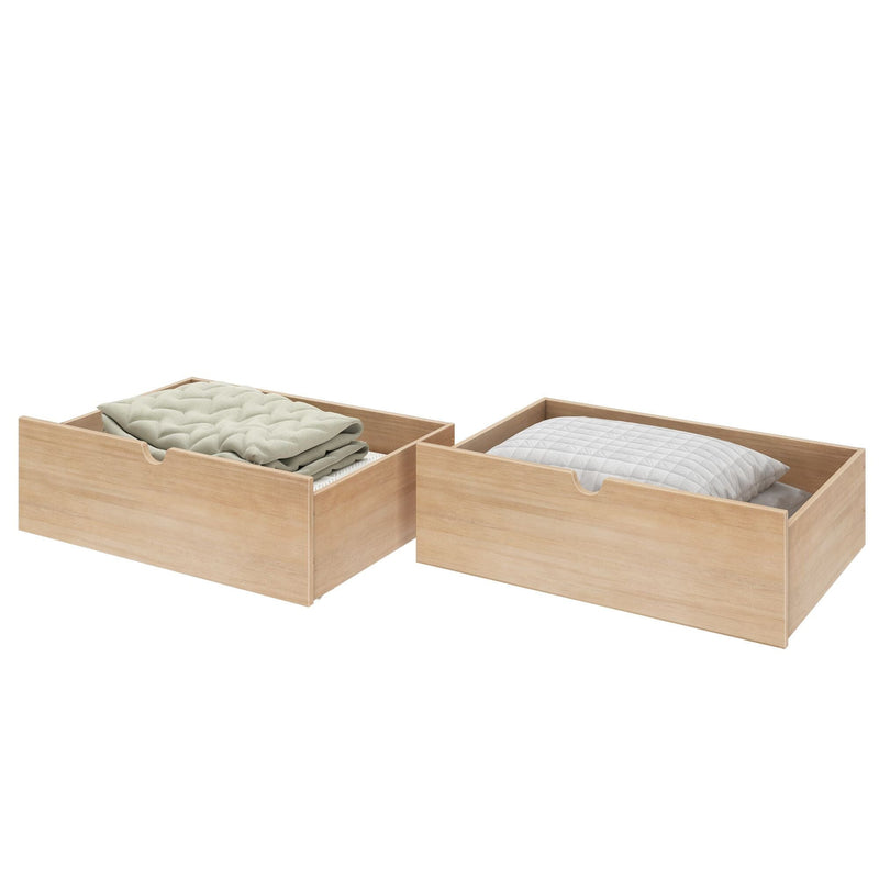 Wooden pull-out underbed storage drawers in natural wood finish holding a folded green quilt and a white quilted pillow, space-saving bedroom bedding storage