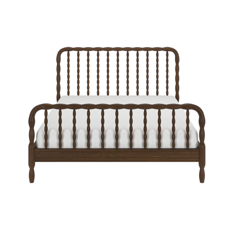 Brown wooden spindle bed frame with matching spindle headboard and footboard and white bedding, front view