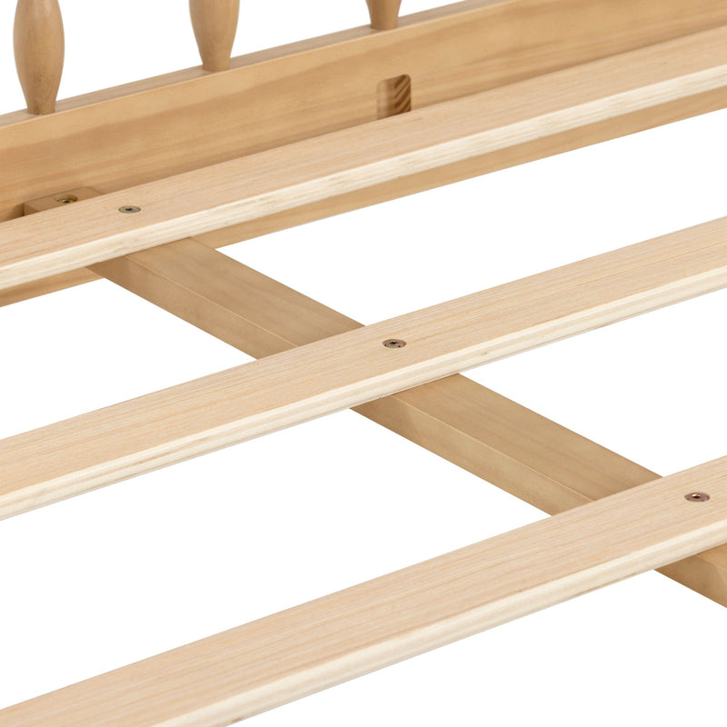 Close-up of natural pine wooden bed slats and frame, slatted bed base for mattress support with visible screws