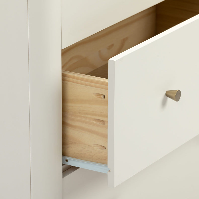 White dresser drawer open with natural wood interior, metal slide and brass knob, minimalist bedroom storage