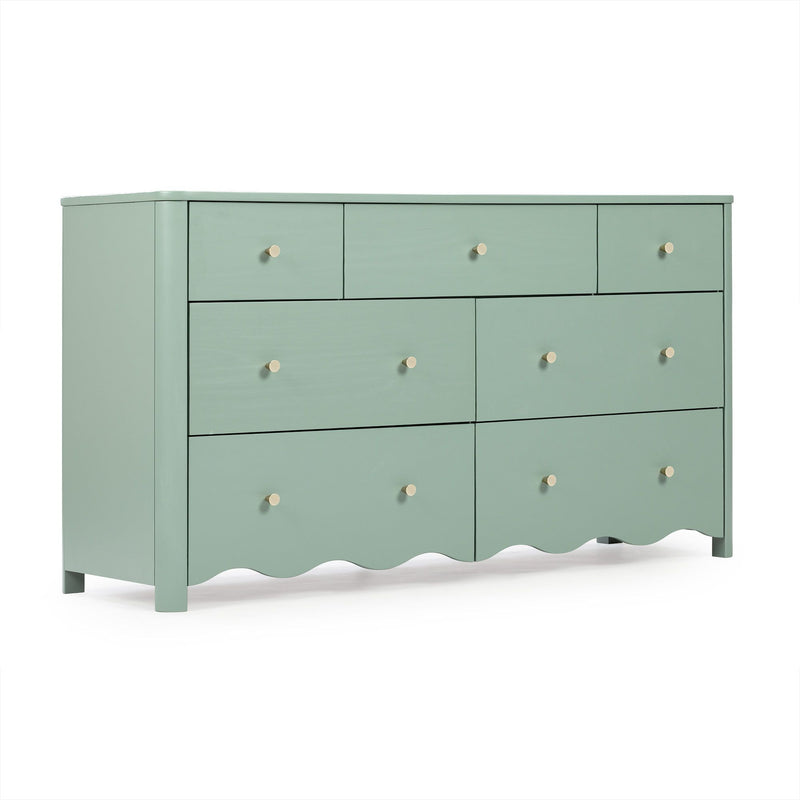 Sage green wooden dresser with multiple drawers and round brass knobs, scalloped base modern bedroom storage chest