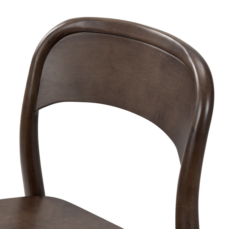Close-up of dark brown solid wood bentwood dining chair back with curved walnut-finish backrest and visible wood grain