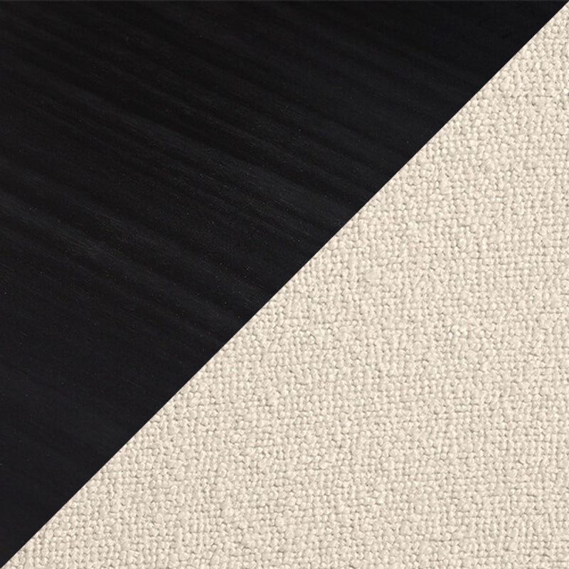 Diagonal close-up of black wood flooring meeting beige looped carpet — modern flooring transition and texture