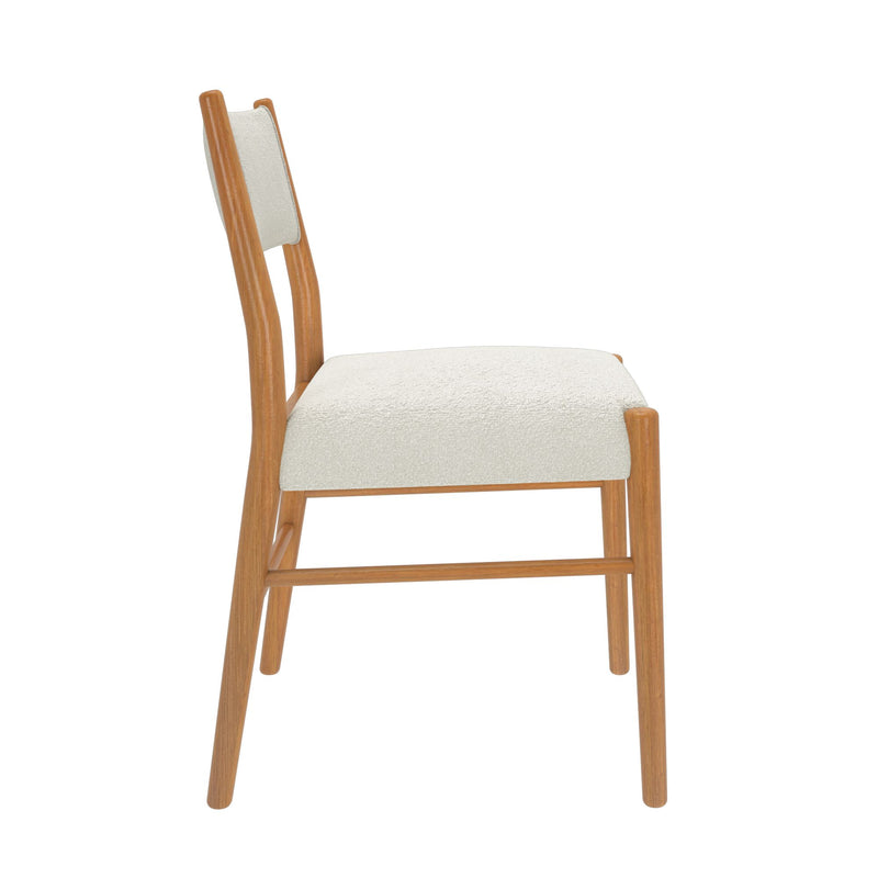 Mid-century modern wooden dining chair with light oak frame, cream boucle upholstered seat and curved backrest, side view on white background