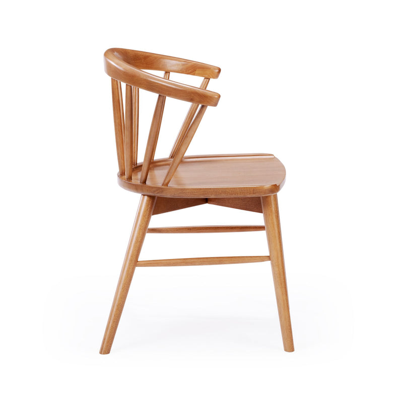 Mid-century modern solid wood dining chair with curved spindle back and natural oak finish on white background