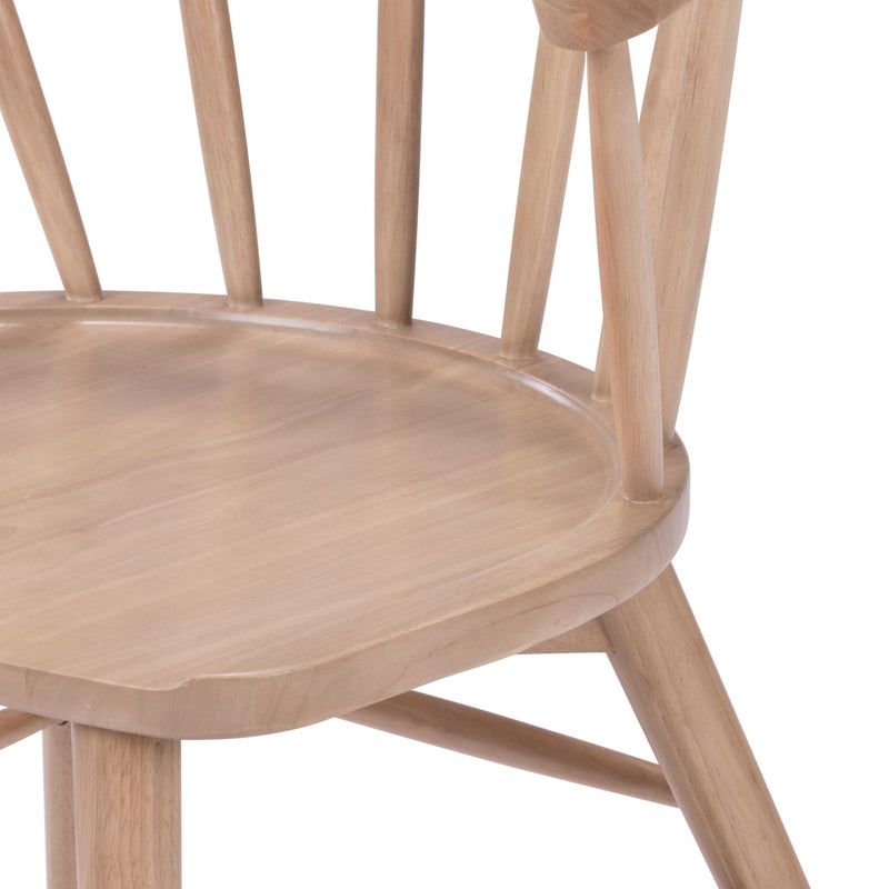 Close-up of light natural wood spindle-back dining chair seat and legs, Scandinavian modern wooden kitchen and dining chair