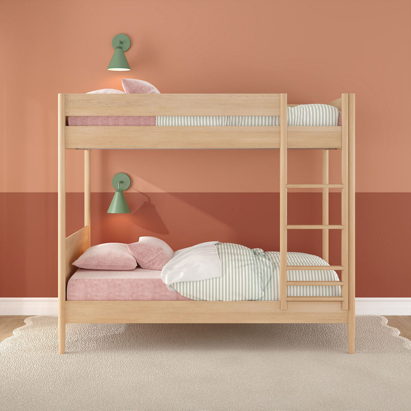Natural wood kids' bunk bed in modern coral bedroom with pink velvet pillows, green wall sconces and striped bedding