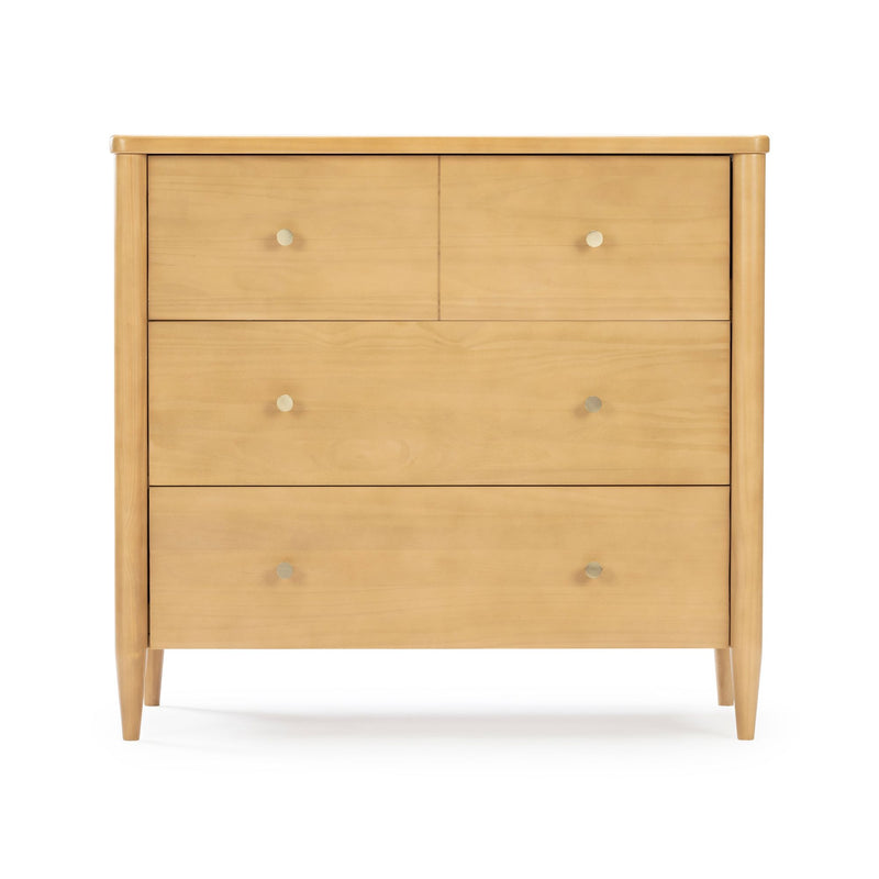 Light natural wood mid-century modern dresser chest of drawers with round metal knobs and tapered legs on white background