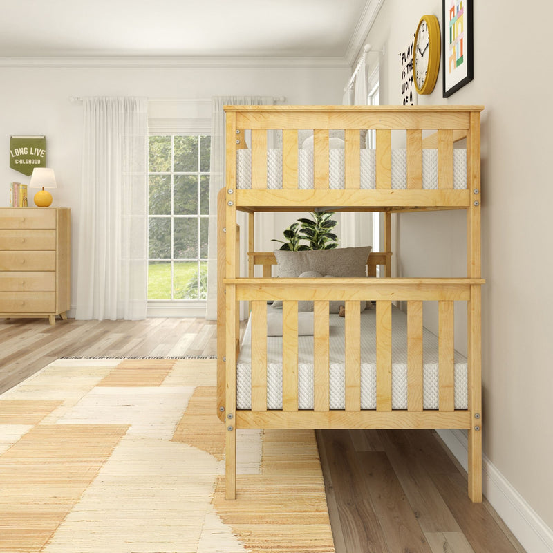 Light oak twin-over-twin wooden bunk bed in bright modern children's bedroom with hardwood floors, large window, dresser and area rug