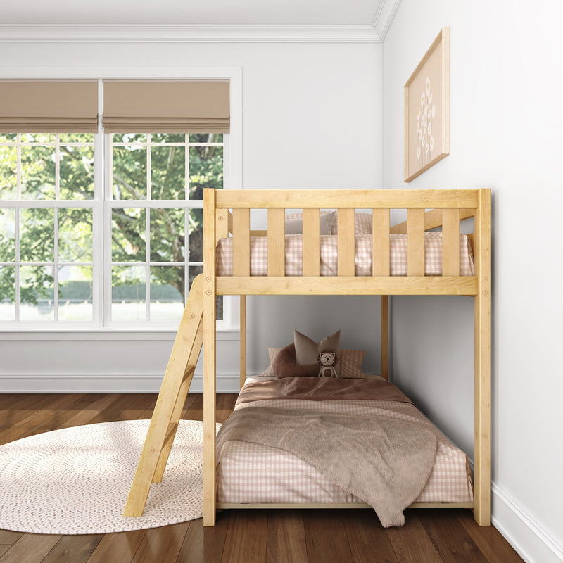Wooden bunk bed in bright kids bedroom with neutral pink gingham bedding, cozy pillows, large window with beige roman shades and natural light