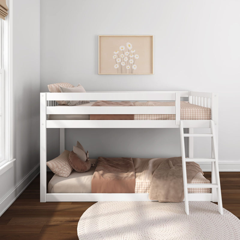 White wooden bunk bed in a minimalist neutral kids' bedroom with beige gingham bedding, soft pillows, ladder and framed daisy wall art