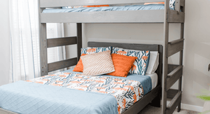 Solid wood loft bed with colorful print bedding