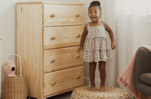 Solid wood 4 drawer dresser in natural finish in girls room