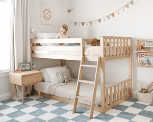 Twin over twin low bunk bed in natural wood kids bedroom