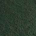 Close-up macro of deep forest green textured upholstery fabric swatch with soft pile and woven pattern