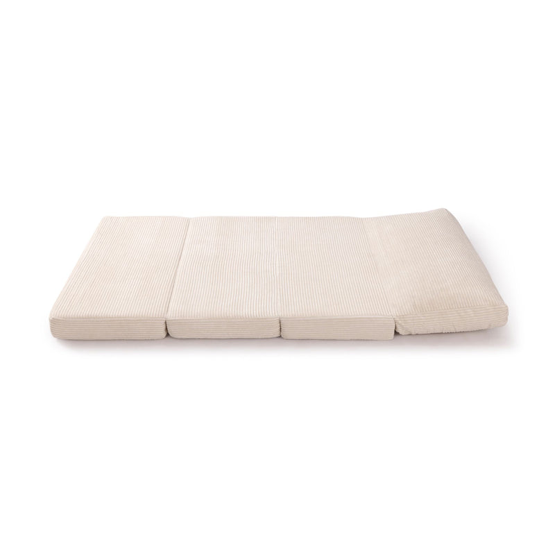 Beige corduroy tri-fold floor mattress, portable foldable futon mattress pad for guests and minimalist bedrooms