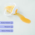 Spilled orange juice from a sippy cup on a waterproof, machine-washable, moisture-wicking surface.