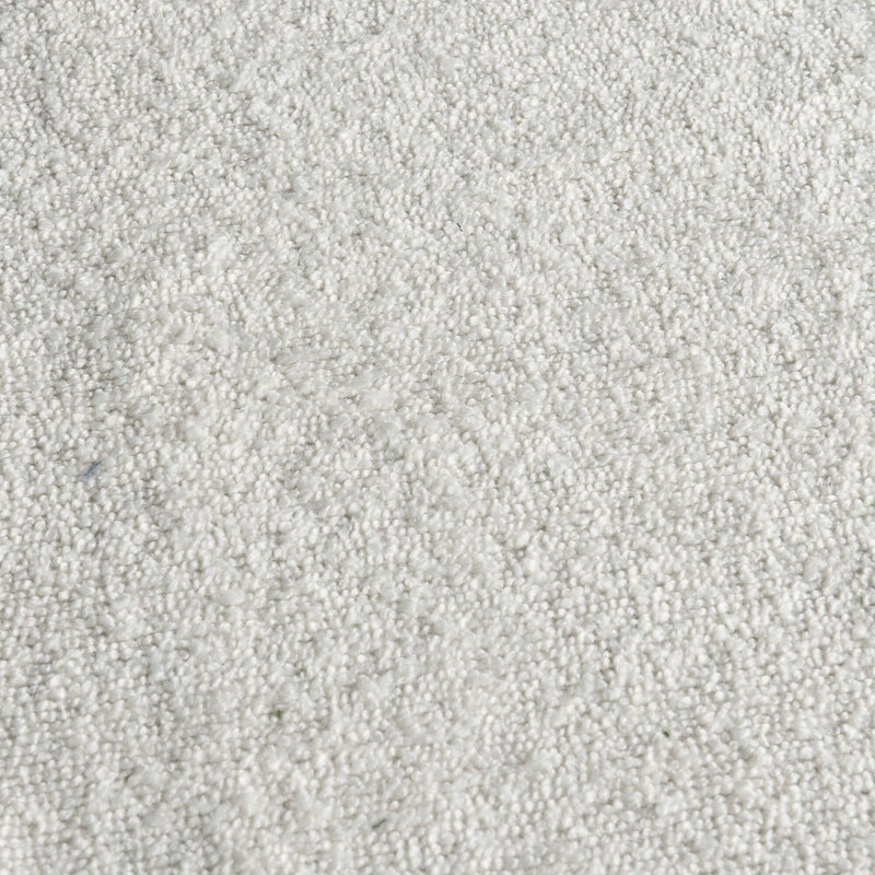 Close-up texture of soft white loop-pile carpet — plush neutral flooring for living room, bedroom, or modern interior design
