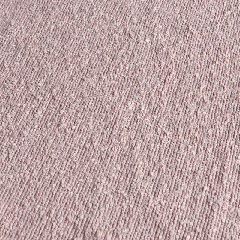 Blush pink textured boucle carpet close-up, ribbed loop pile soft textile ideal for modern bedroom rug and interior design